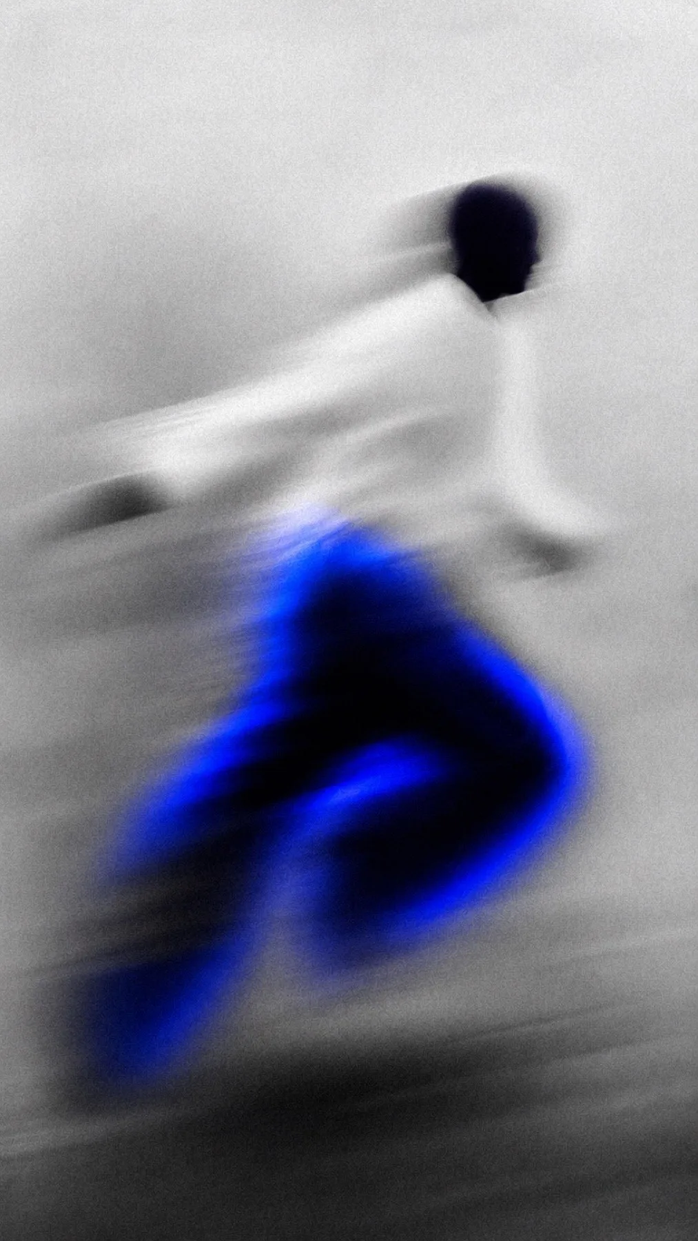 Human figures blurred through an electric-blue field.
